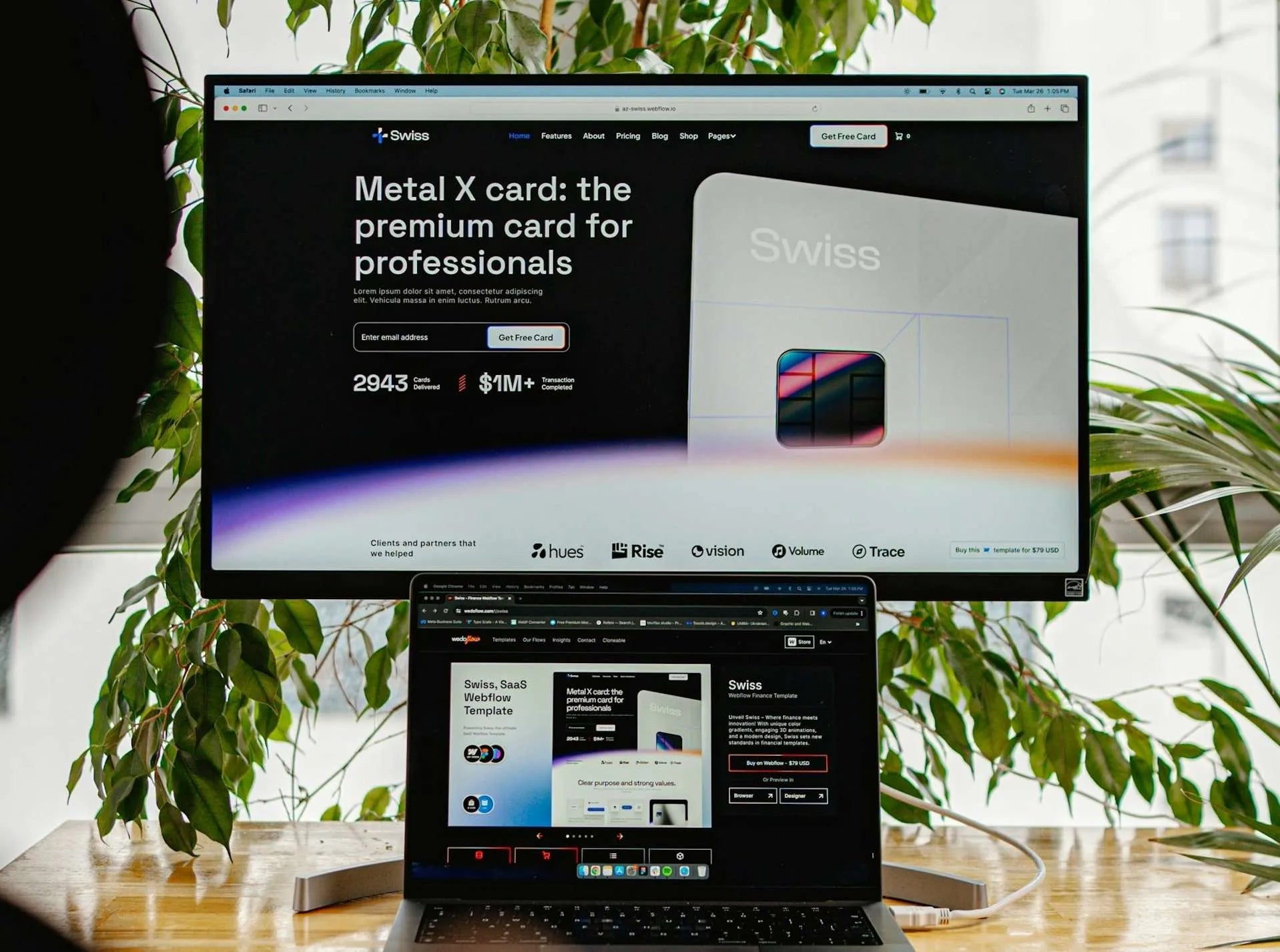 Large 4K monitor displaying a website, connected to a laptop, ideal for outdoor use.