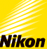 Nikon logo: black text on a bright yellow background with white light rays.