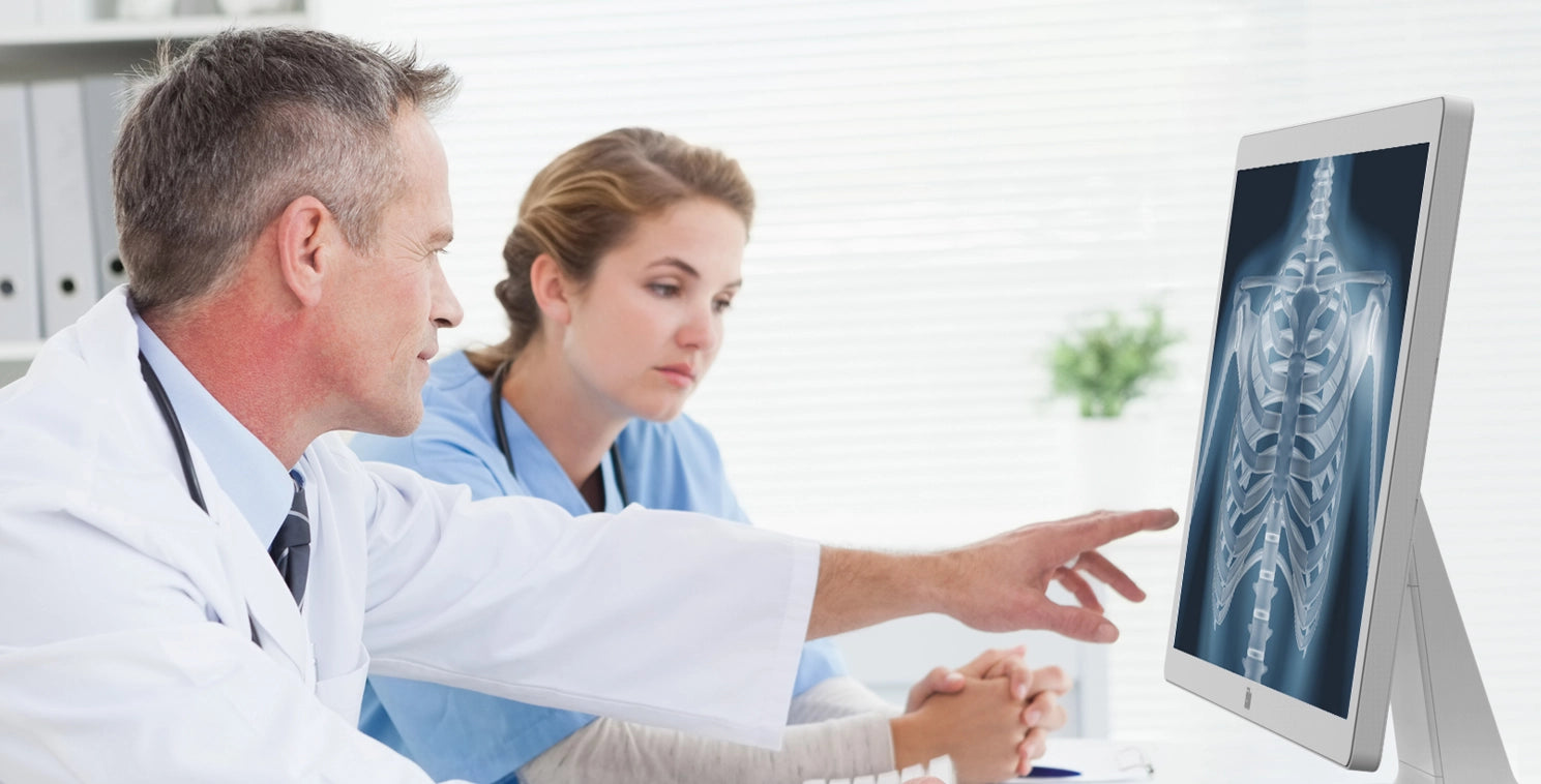 doctor using 4k touch screen