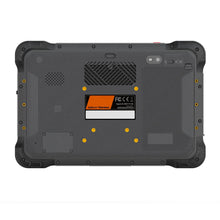 Back view of a rugged tablet with visible branding and certification labels on a white background