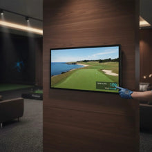 Touch Screen Guru 32-inch 4K monitor displaying a golf course simulation. A hand in a blue glove touches the screen.